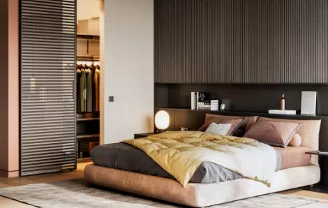 łóżko z kolorową narzutą